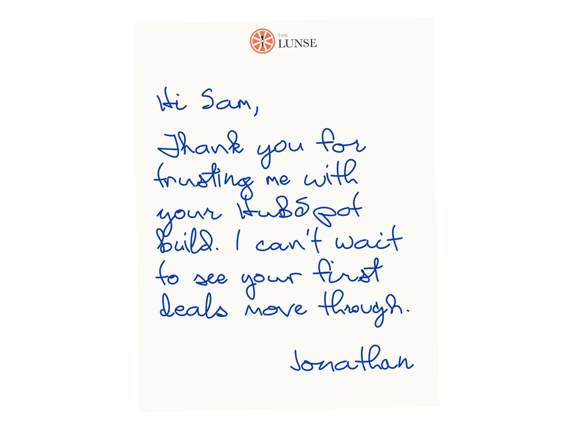 Inside of the card: A thank-you note to a client named Sam, written in blue ink and signed Jonathan